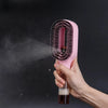 Scalp massage brush spray function in use